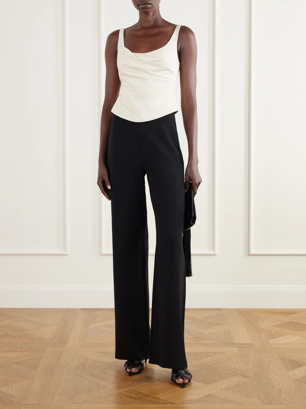 Image of a model wearing Tops. Product name - Draped Tussah Silk-blend Bustier Top in Cream colour by brand - ST. AGNI