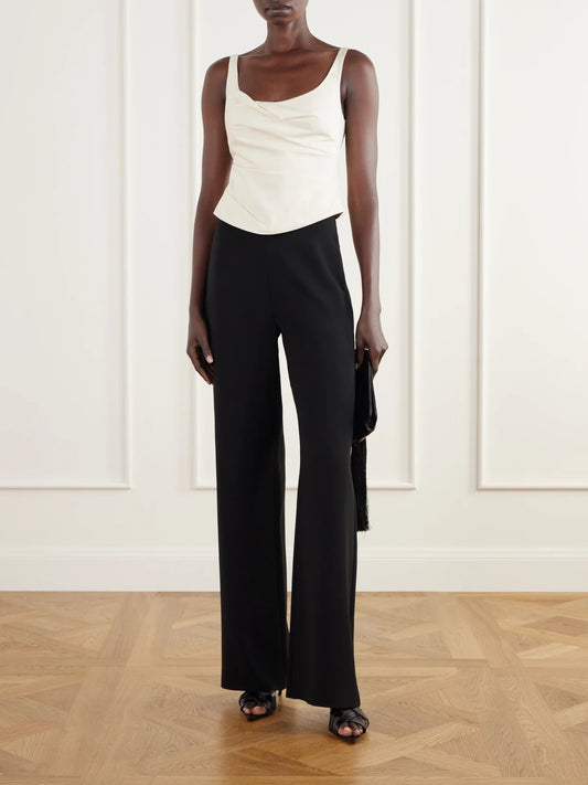 Image of a model wearing Tops. Product name - Draped Tussah Silk-blend Bustier Top in Cream colour by brand - ST. AGNI