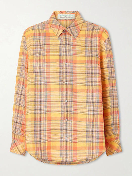 Image of a model wearing Tops. Product name - Twilight Checked Linen Shirt in Orange colour by brand - God's True Cashmere