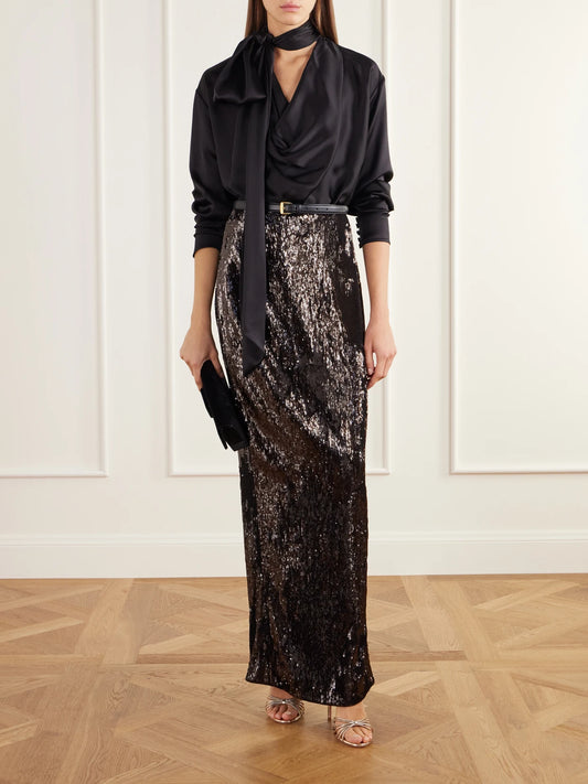 Image of a model wearing Tops. Product name - Scarf-detailed Gathered Silk-satin Blouse in Black colour by brand - Balmain