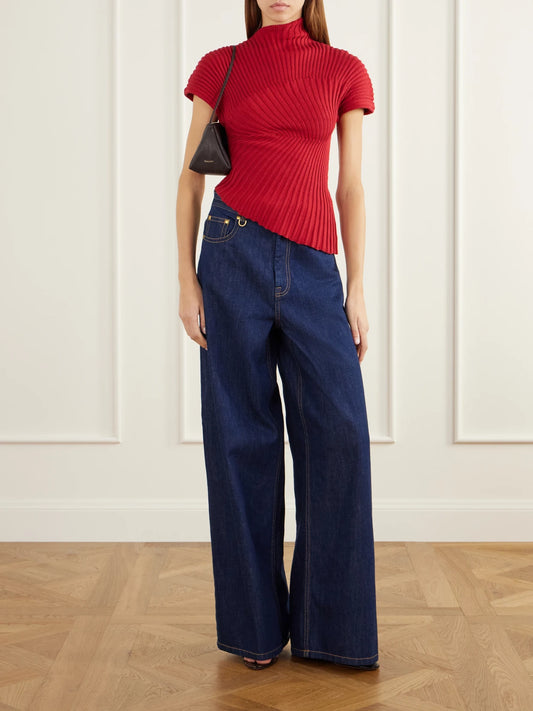 Image of a model wearing Tops. Product name - Annemie Asymmetric Rib-knitted Cotton Top in Red, Black colour by brand - Cult Gaia