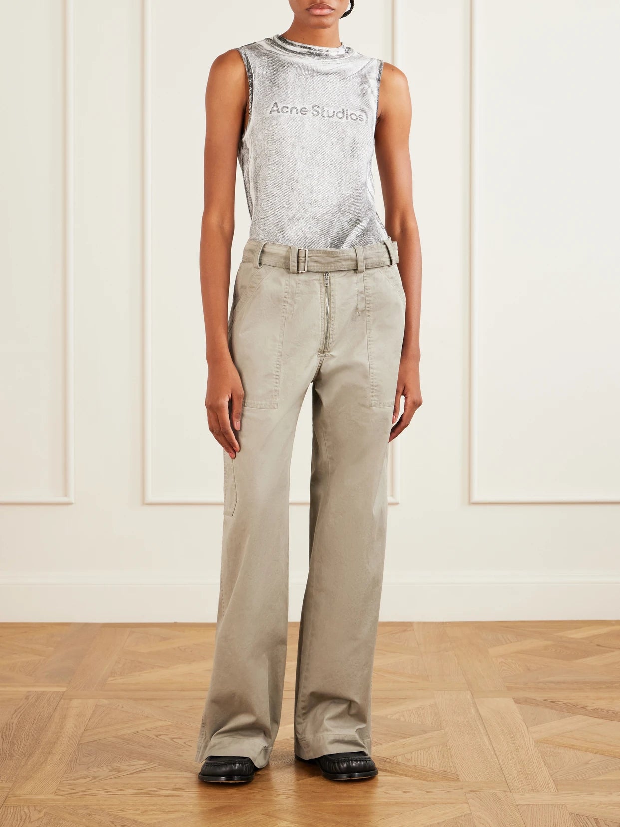 Image of a model wearing Pants. Product name - Belted Cotton-blend Gabardine Wide-leg Pants in Beige colour by brand - Acne Studios