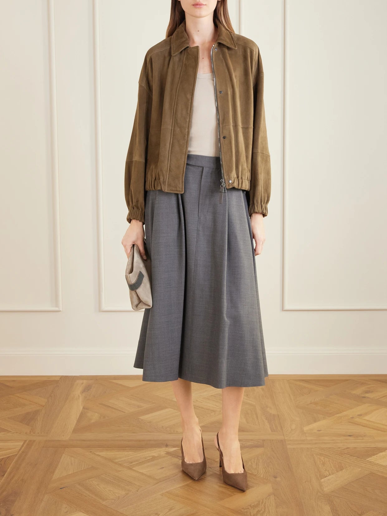 Image of a model wearing Skirts. Product name - Pleated Wool-blend Midi Skirt in Gray colour by brand - Brunello Cucinelli