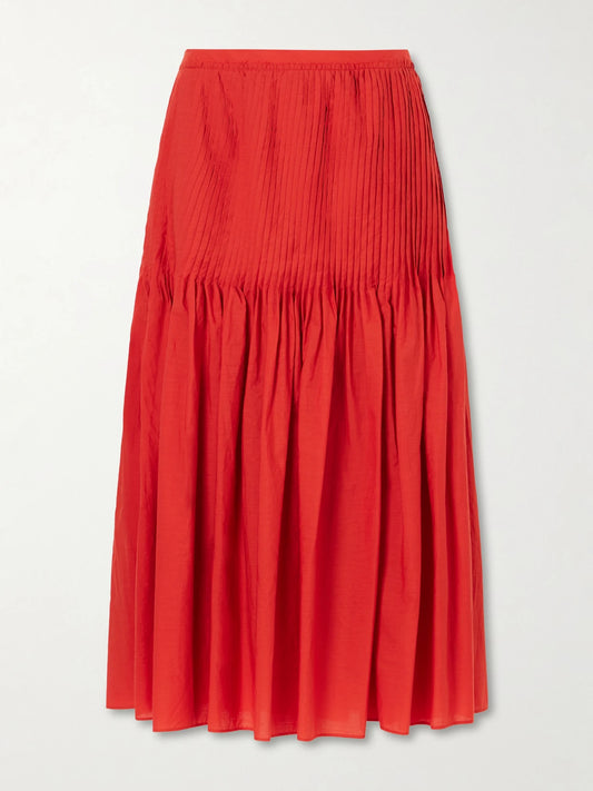 Image of a model wearing Skirts. Product name - Pleated Cotton-poplin Midi Skirt in Red colour by brand - Auralee