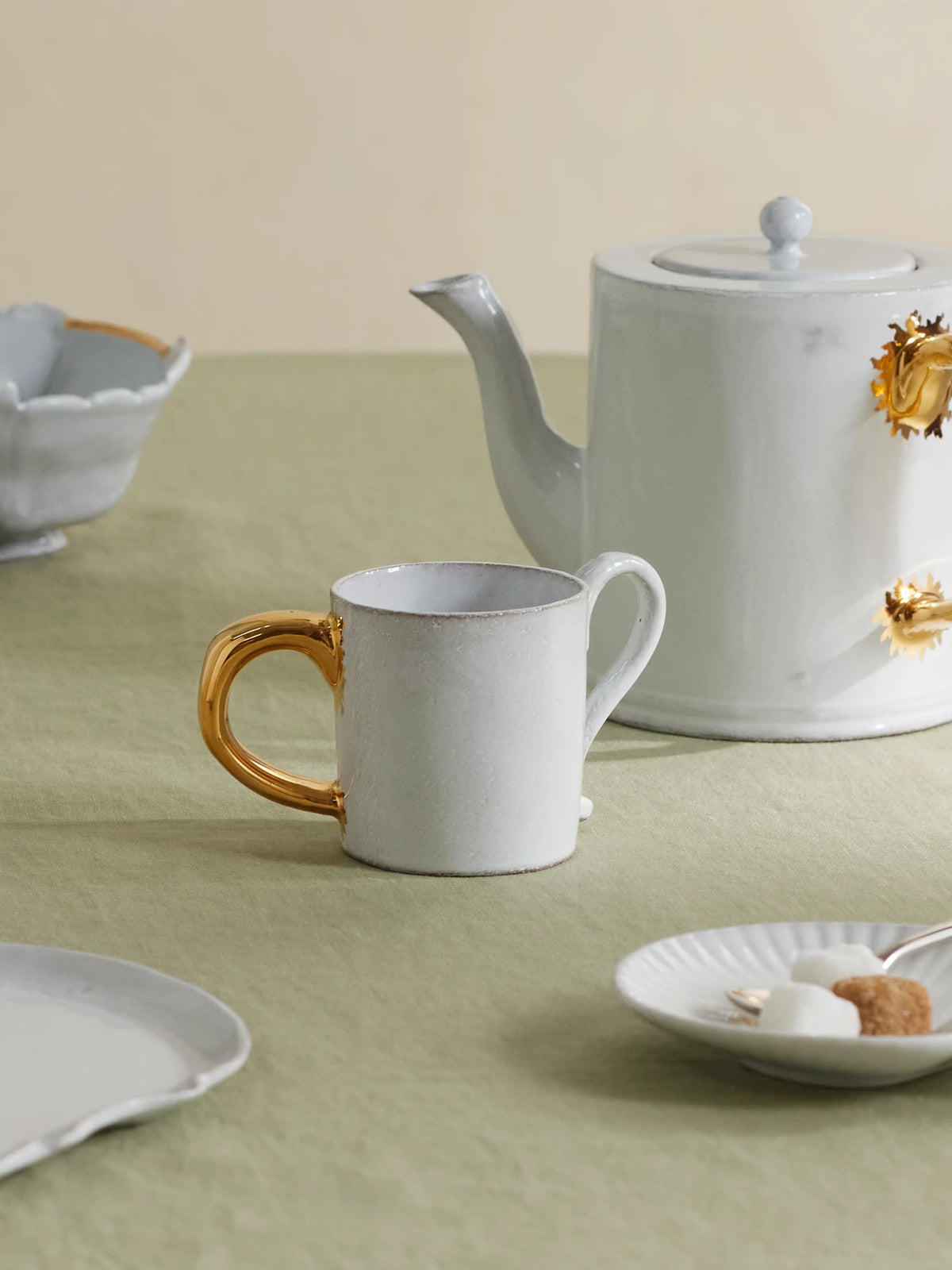 Image of Tableware. Product name - + Sacai Gold-plated Ceramic Coffee Cup in White colour by brand - Astier De Villatte