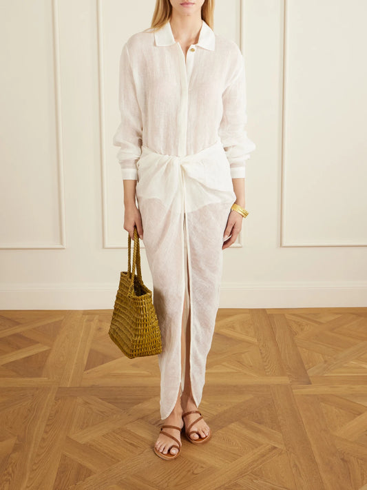 Image of a model wearing Skirts. Product name - Qaraya Light Linen Pareo Skirt in White colour by brand - Le Kasha