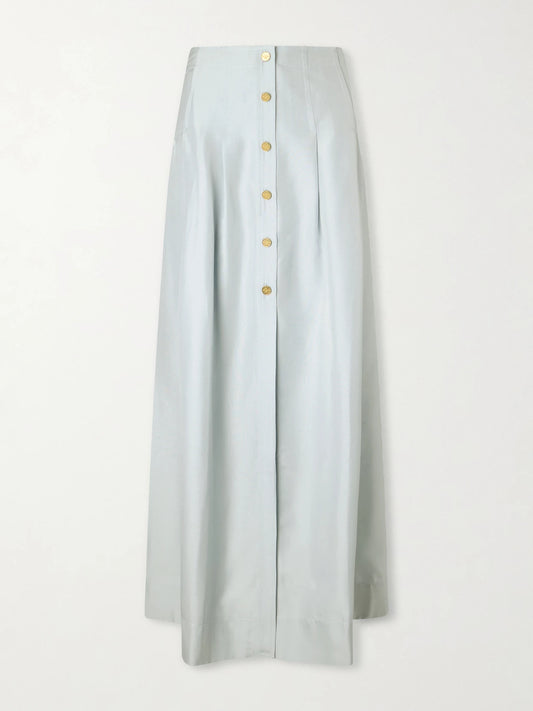 Image of a model wearing Skirts. Product name - Amou Pleated Silk Maxi Skirt in Sky blue colour by brand - Le Kasha