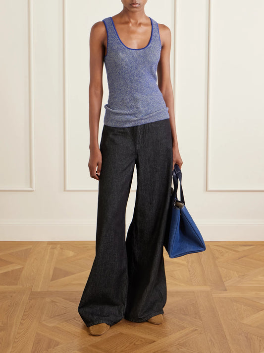 Image of a model wearing Tops. Product name - Marl Knitted Cashmere Tank in Blue colour by brand - The Elder Statesman