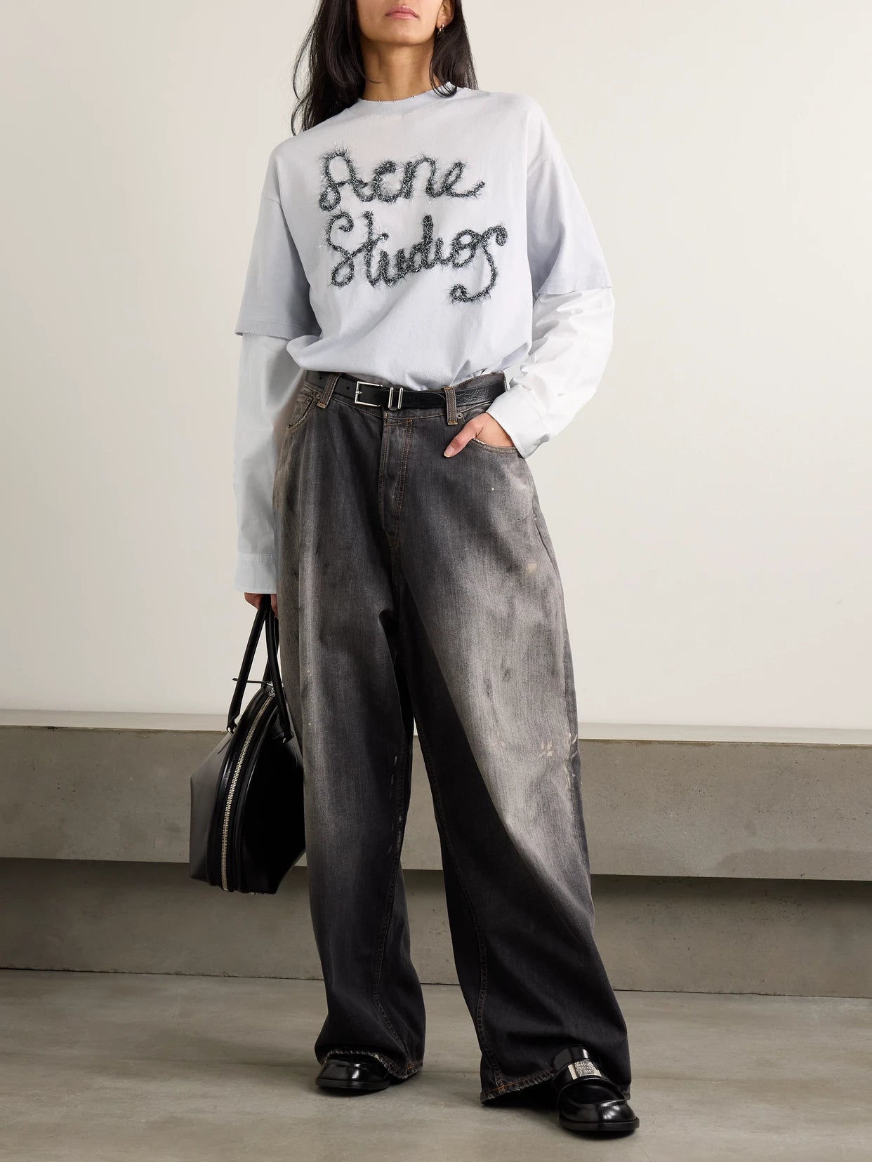 Image of a model wearing Tops. Product name - Layered Embroidered Cotton-jersey And Poplin T-shirt in Light blue colour by brand - Acne Studios