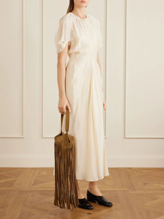 Image of Dresses. Product name - Ria Silk-blend Midi Dress in Ivory colour by brand - KHAITE