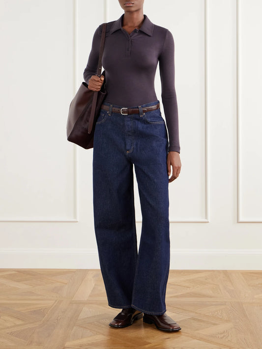 Image of a model wearing Tops. Product name - Amos Stretch-lyocell Polo Shirt in Burgundy colour by brand - AGOLDE