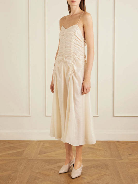 Image of Dresses. Product name - Raina Ruched Silk-blend Midi Dress in Ivory colour by brand - KHAITE