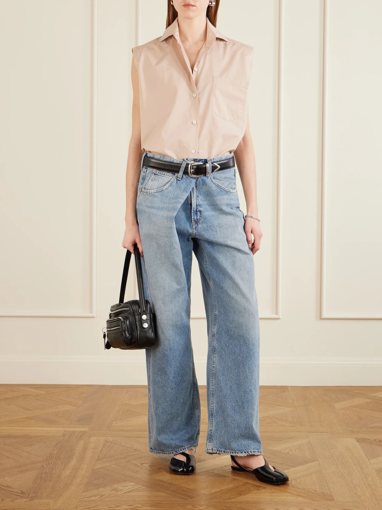Image of a model wearing Tops. Product name - Cotton And Silk Blend Blouse in Blush colour by brand - Acne Studios