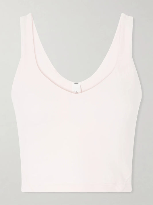 Image of a model wearing Tops. Product name - Align Stretch-jersey Tank in Baby pink colour by brand - lululemon