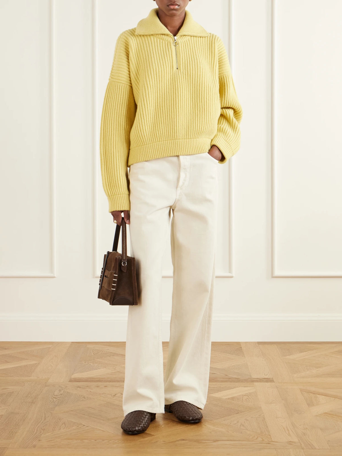 Image of a model wearing Outerwear. Product name - Ribbed Wool Half-zip Sweater in Yellow colour by brand - &Daughter