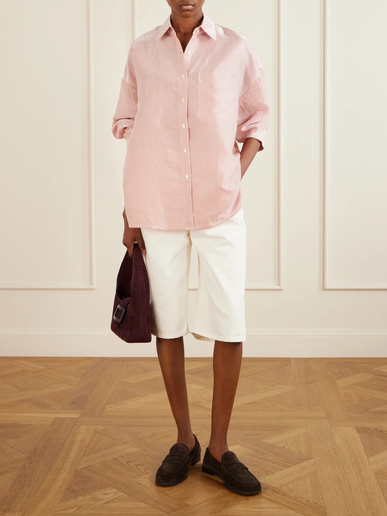 Image of a model wearing Tops. Product name - Something Borrowed Striped Cotton-organza Shirt in Pink colour by brand - TWP