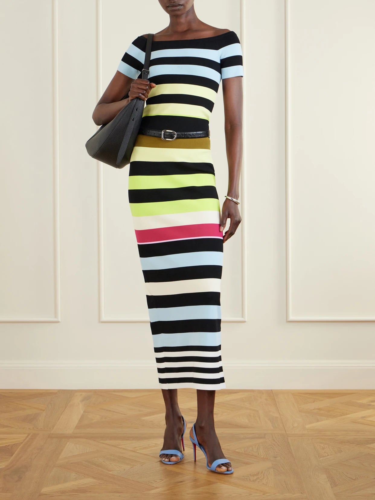 Image of a model wearing Tops. Product name - Off-shoulder Striped Jersey Top in Multi colour by brand - Christopher John Rogers