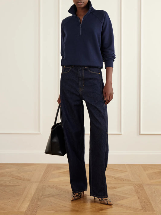 Image of a model wearing Tops. Product name - The Quarter Zip Cotton Sweatshirt in Navy colour by brand - Jamie Haller