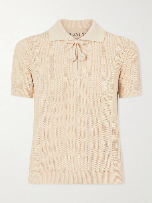 Image of a model wearing Outerwear. Product name - Pointelle-knit Cotton Polo Shirt in Cream colour by brand - Valentino Garavani