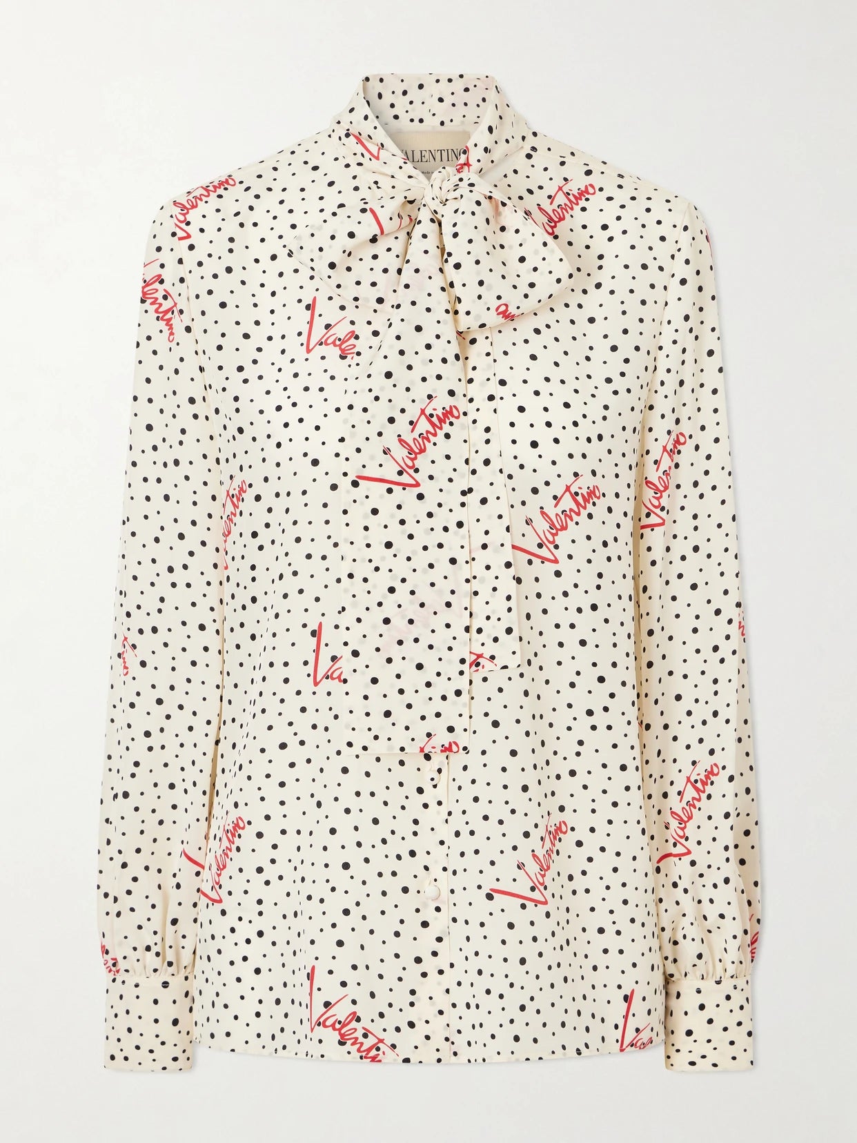 Image of a model wearing Tops. Product name - Pussy-bow Polka-dot Silk Crepe De Chine Blouse in Cream colour by brand - Valentino Garavani