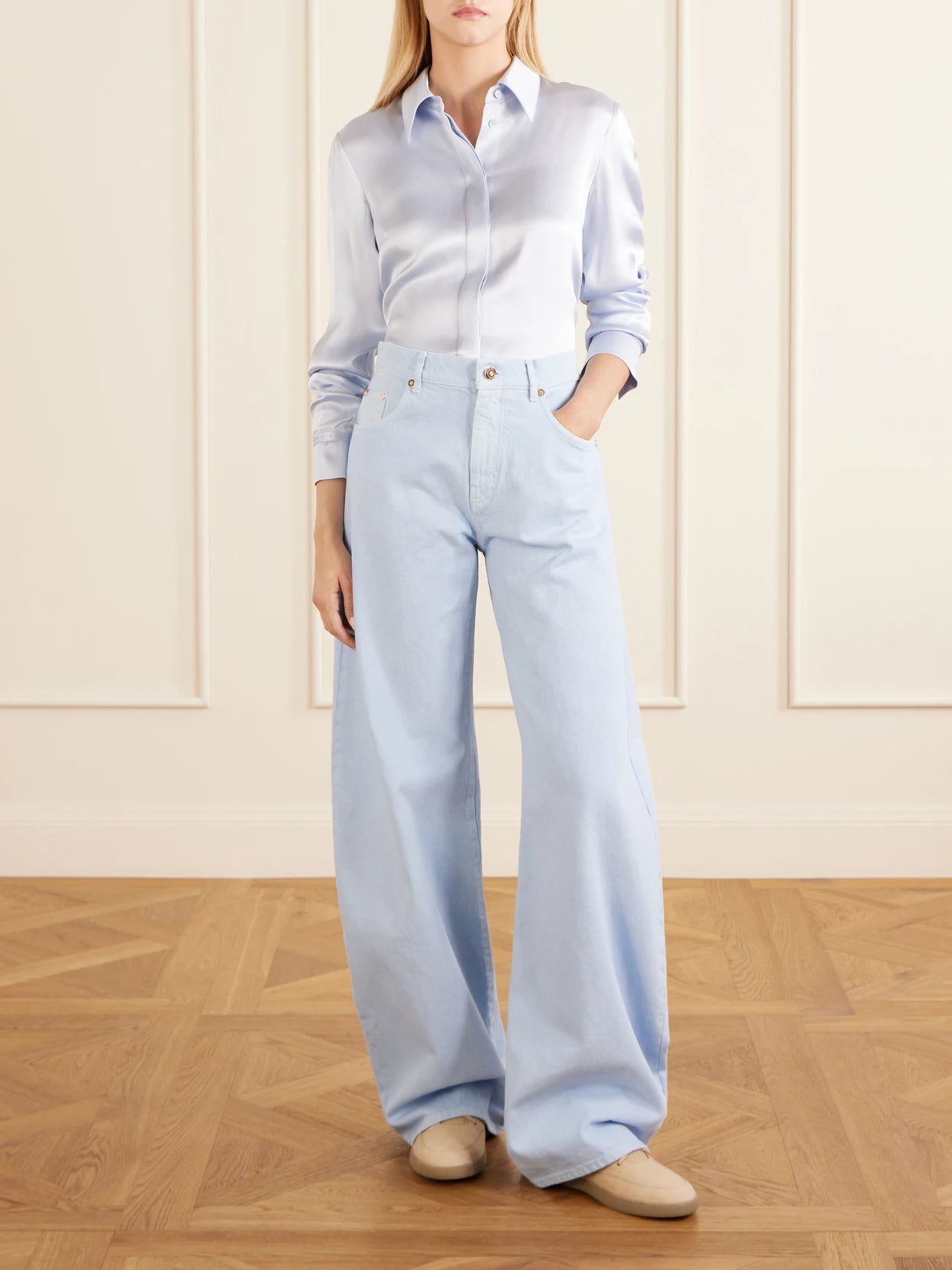 Image of a model wearing Tops. Product name - Cruz Silk-satin Shirt in Sky blue colour by brand - Gabriela Hearst