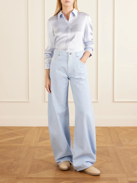 Image of a model wearing Tops. Product name - Cruz Silk-satin Shirt in Sky blue colour by brand - Gabriela Hearst