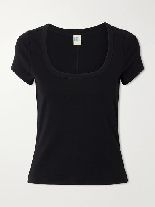 Image of a model wearing Tops. Product name - Lulu Baby Organic Cotton-jersey T-shirt in Black colour by brand - FLORE FLORE