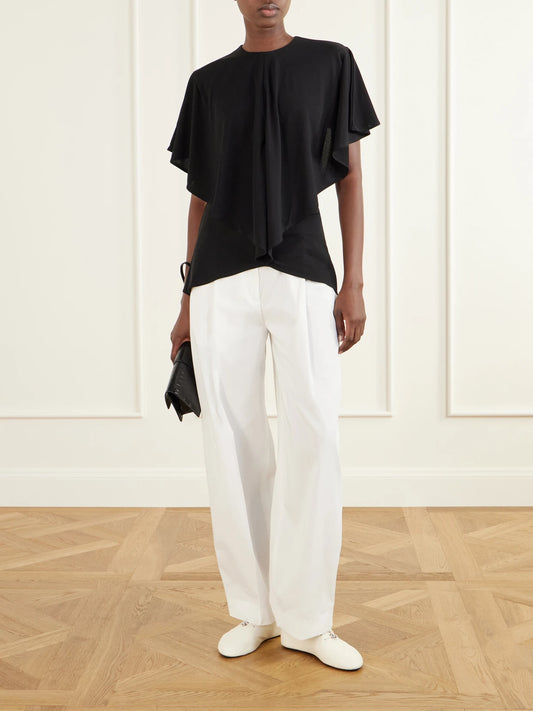 Image of a model wearing Tops. Product name - Le Haut Pisco Draped Crepe Blouse in Black colour by brand - Jacquemus