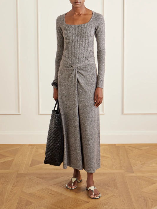 Image of a model wearing Skirts. Product name - Knotted Marl Knitted Cashmere Midi Skirt in Brown colour by brand - The Elder Statesman