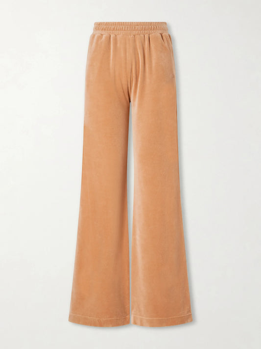 Image of a model wearing Pants. Product name - Wide-leg Cotton-blend Velvet Pants in Light brown colour by brand - Chloé