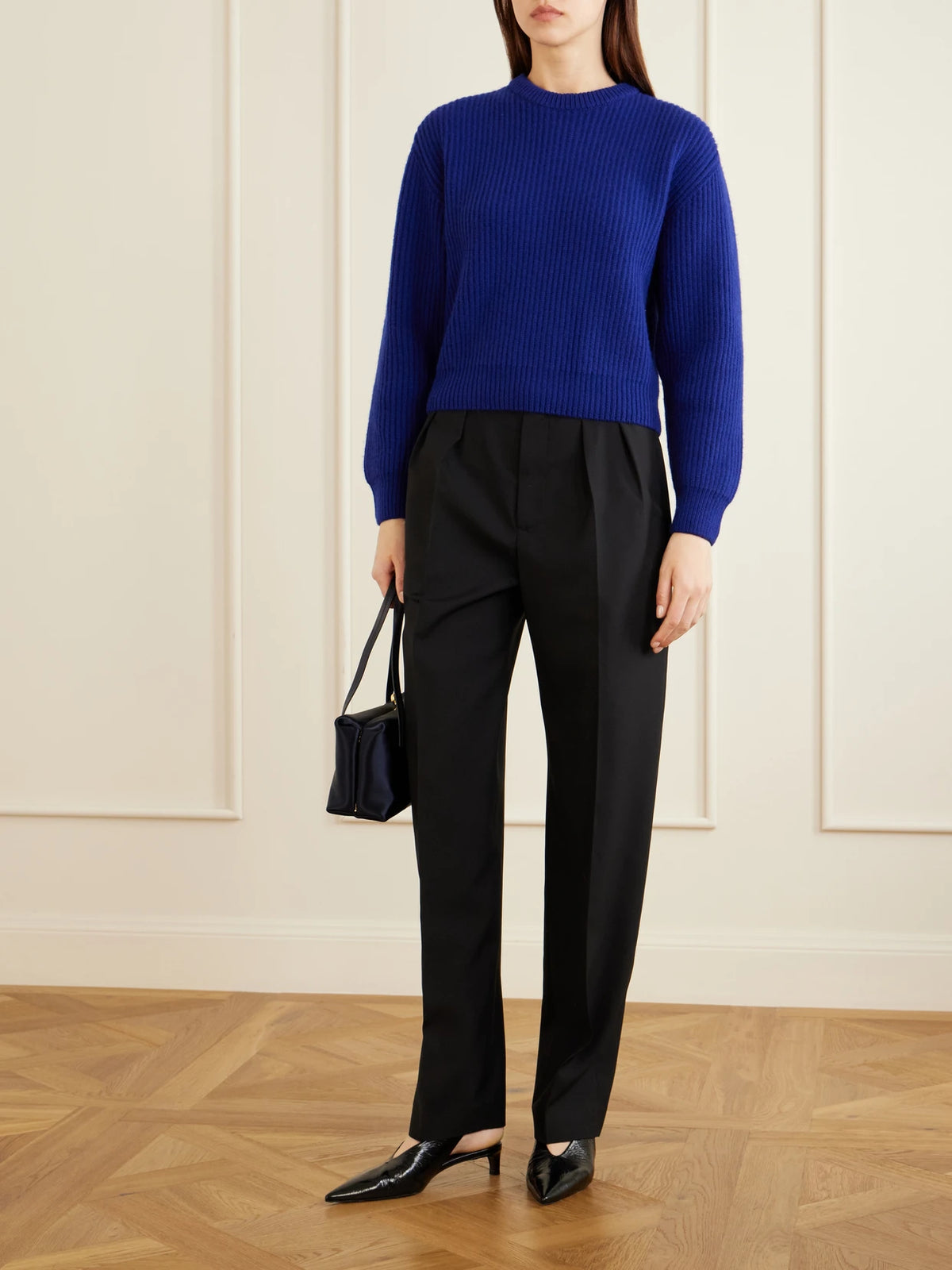 Image of a model wearing Outerwear. Product name - Ribbed-knit Wool Sweater in Cobalt blue colour by brand - Jil Sander