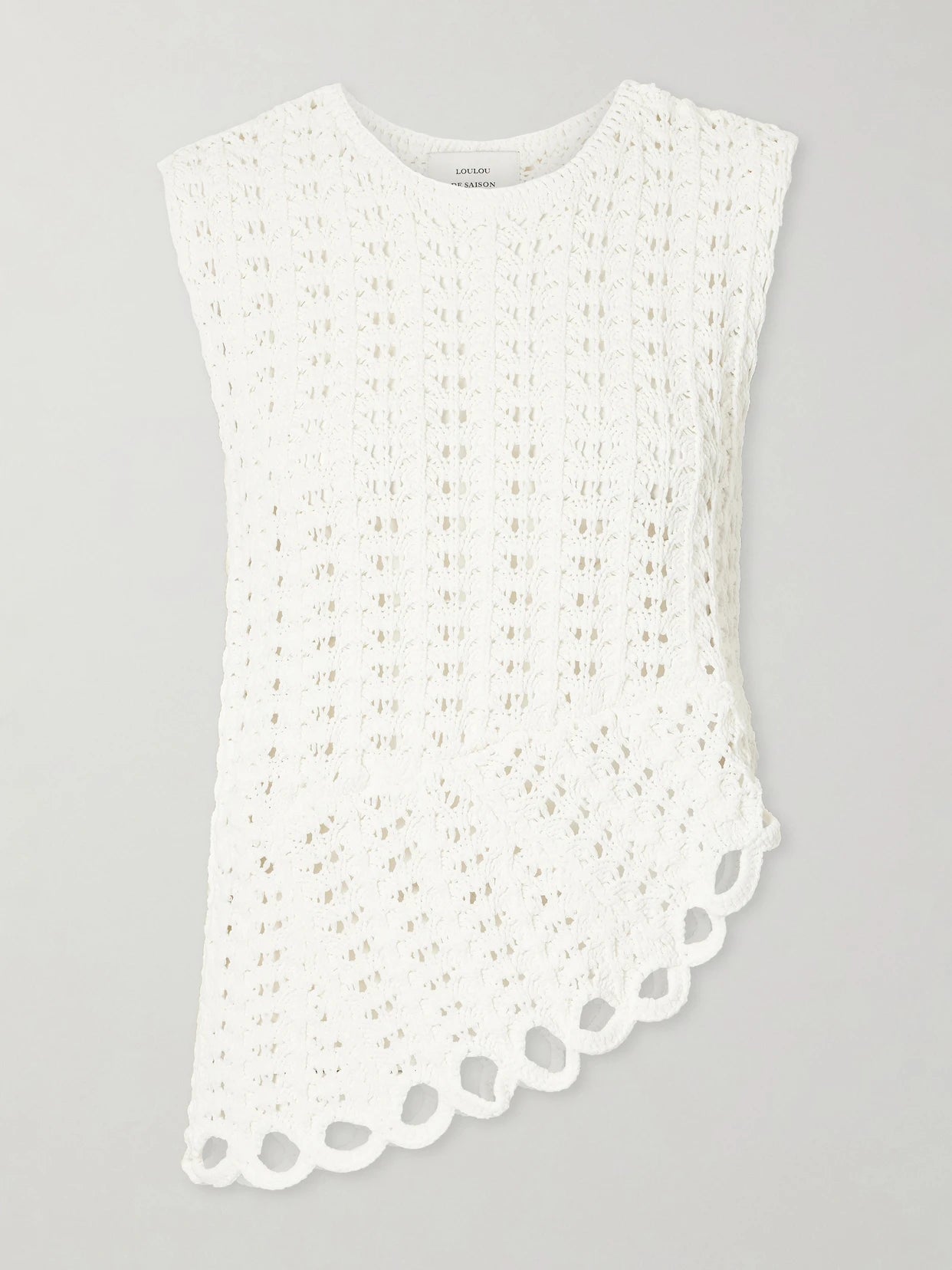 Image of a model wearing Tops. Product name - Saez Crocheted Top in Ivory colour by brand - Loulou de Saison