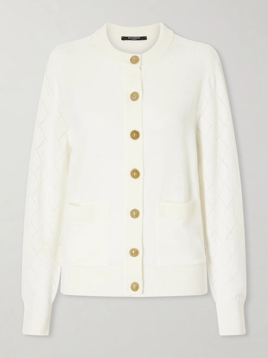 Image of a model wearing Outerwear. Product name - Cotton Pointelle-knit Cardigan in White colour by brand - Balmain