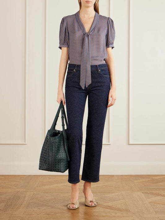 Image of a model wearing Tops. Product name - The Sonnet Checked Silk Blouse in Brown colour by brand - FRAME