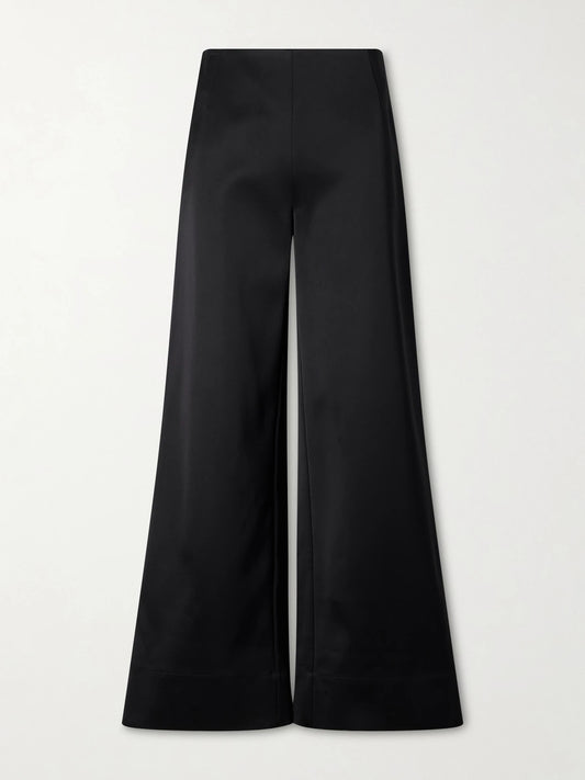 Image of a model wearing Pants. Product name - Satin Wide-leg Pants in Black colour by brand - TOTEME