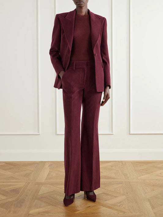 Image of a model wearing Outerwear. Product name - Browning Ribbed Wool And Silk-blend Sweater in Burgundy colour by brand - Gabriela Hearst