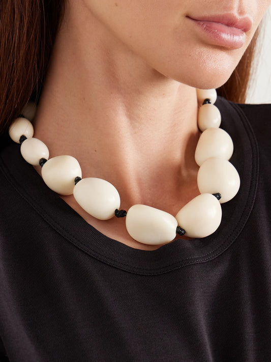 Image of Necklaces. Product name - The Statement Tagua And Leather Necklace in Ivory colour by brand - Hunting Season