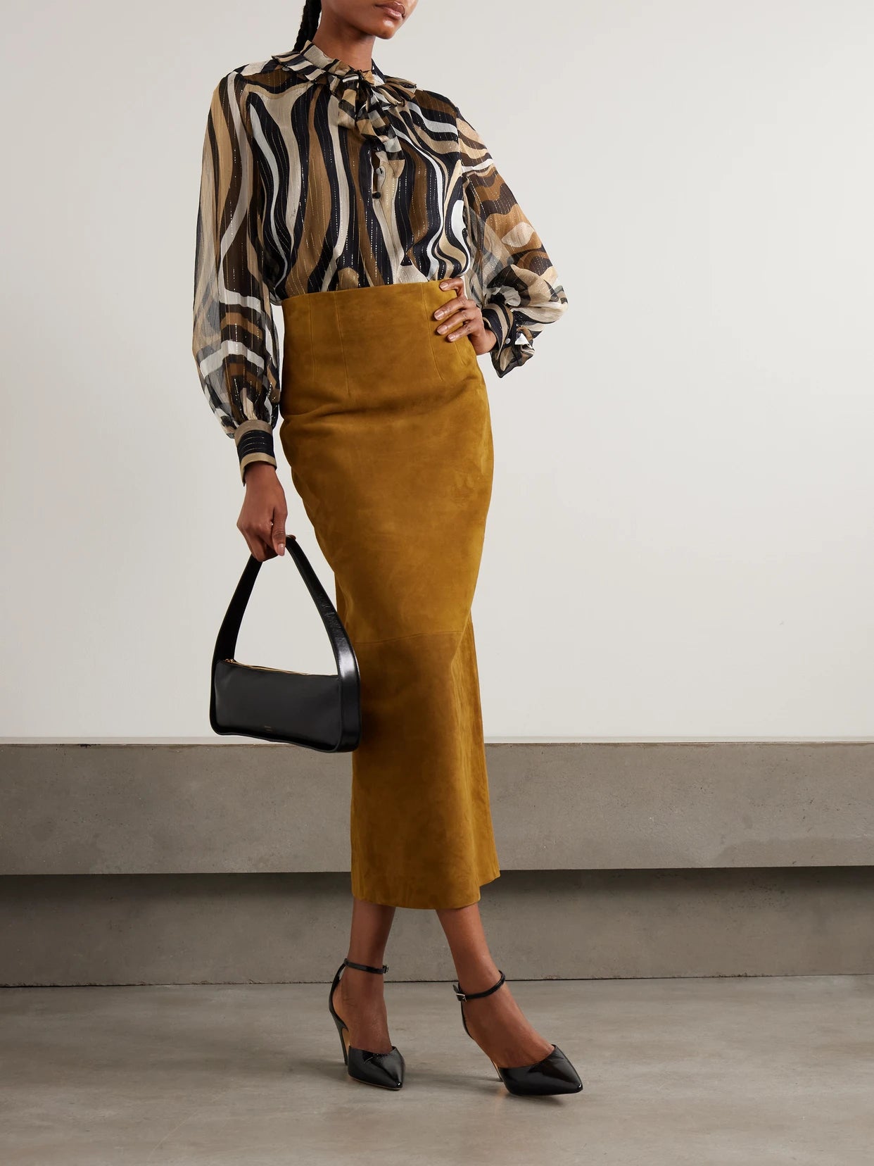 Image of a model wearing Tops. Product name - Ruffled Metallic Silk-blend Crepon Pussy-bow Blouse in Gold colour by brand - PUCCI