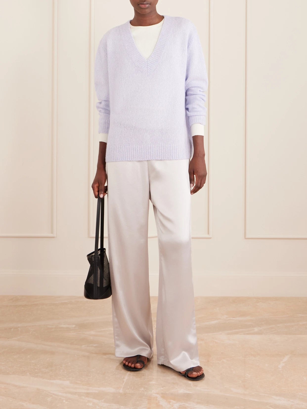 Image of a model wearing Outerwear. Product name - Leona Cashmere And Silk-blend Sweater in Purple colour by brand - LISA YANG