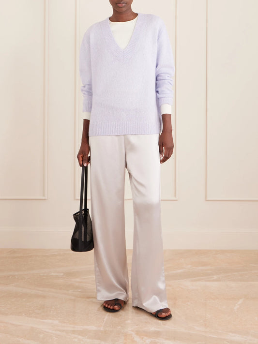 Image of a model wearing Outerwear. Product name - Leona Cashmere And Silk-blend Sweater in Purple colour by brand - LISA YANG