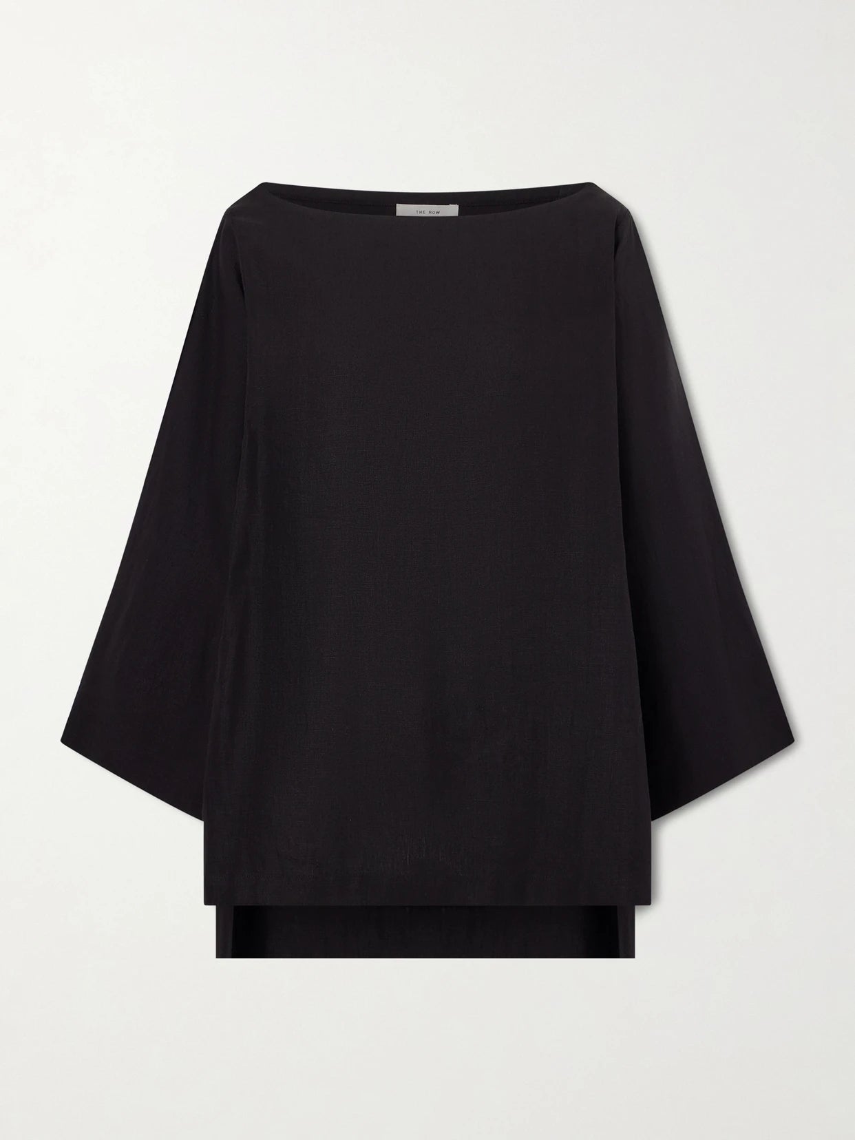 Image of a model wearing Tops. Product name - Junia Oversized Linen Blouse in Black colour by brand - The Row