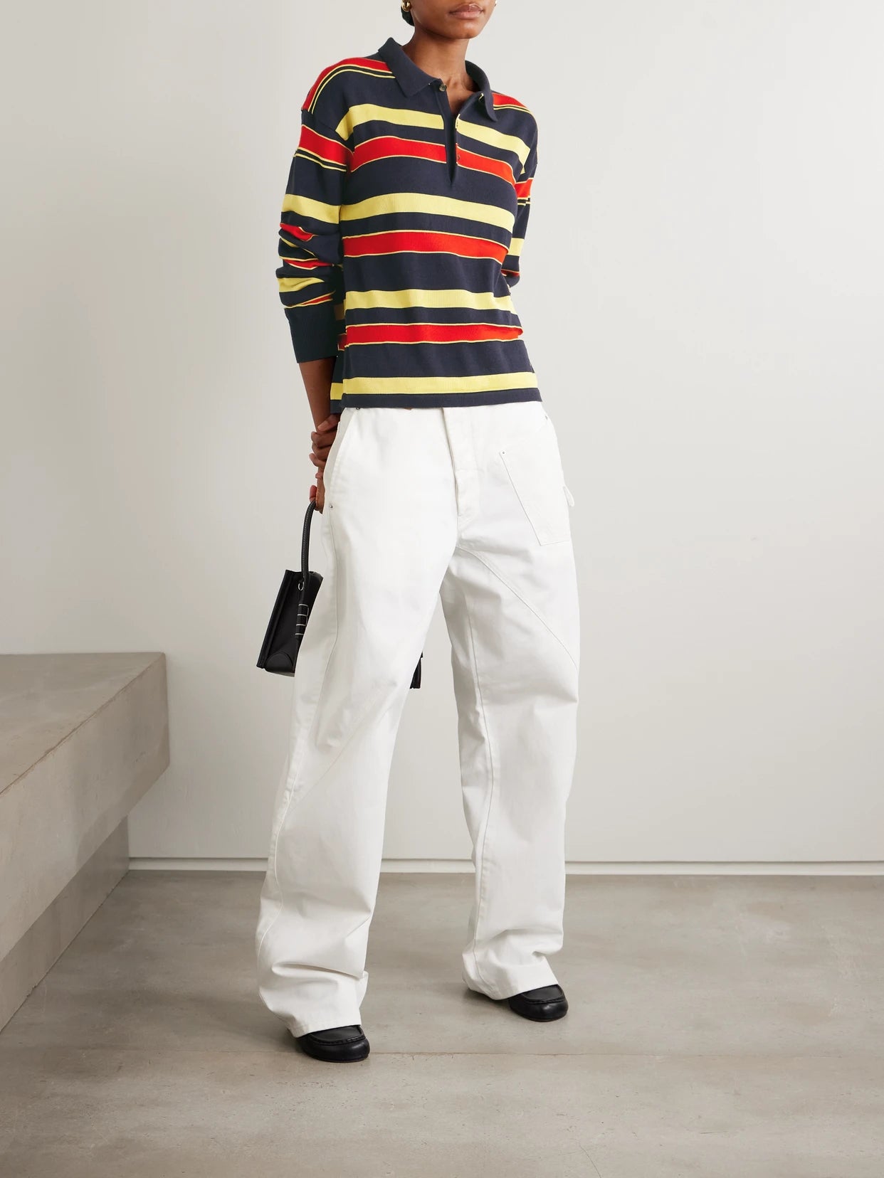 Image of a model wearing Outerwear. Product name - Embroidered Striped Cotton And Wool-blend Polo Shirt in Multi colour by brand - JW Anderson