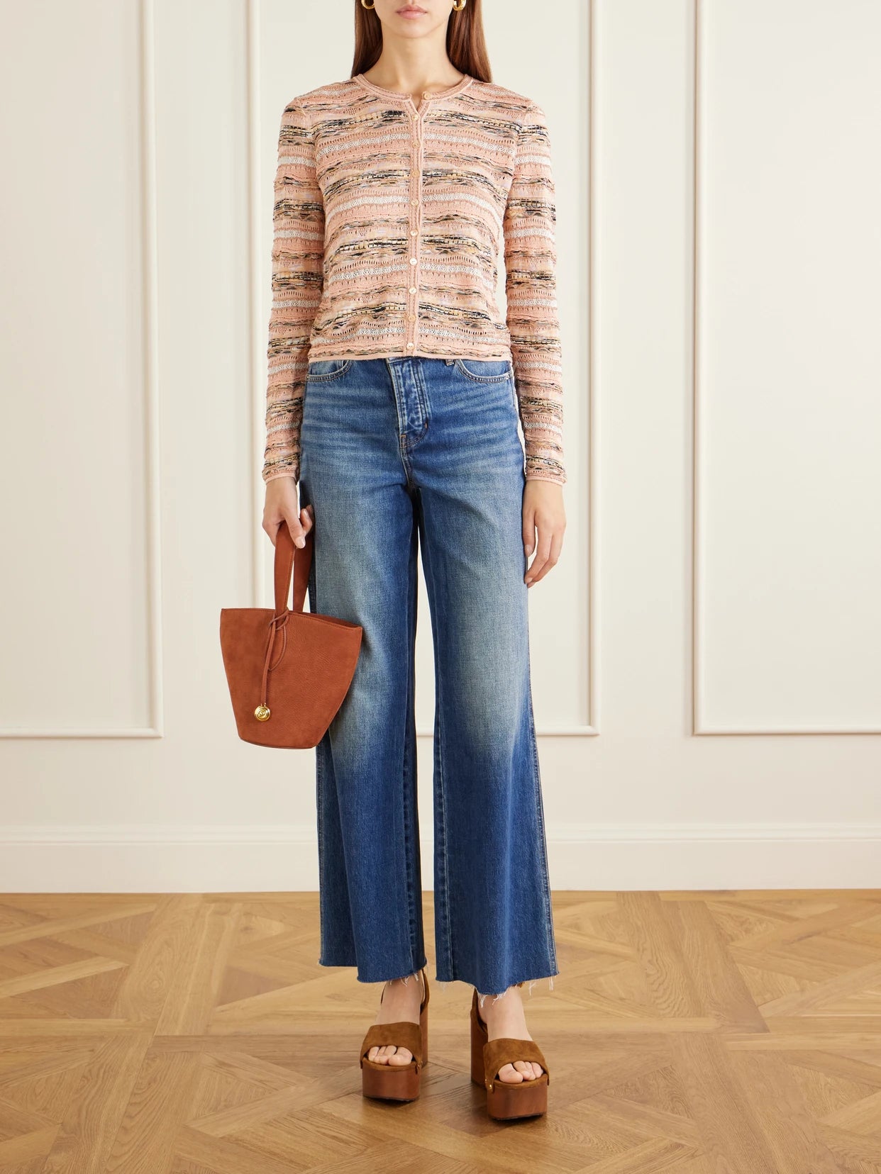Image of a model wearing Outerwear. Product name - Mia Striped Pointelle-knit Cardigan in Pink colour by brand - Ulla Johnson