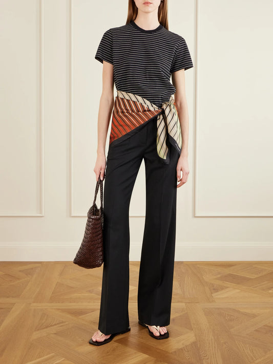 Image of a model wearing Tops. Product name - Kenzie Striped Cotton-jersey T-shirt in Black colour by brand - KALLMEYER