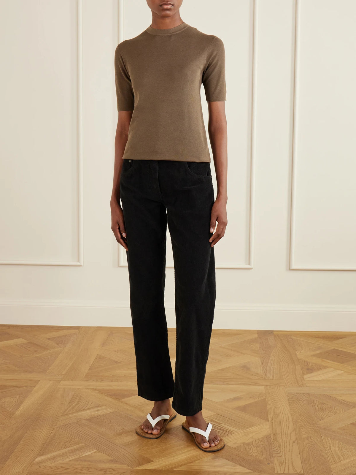 Image of a model wearing Outerwear. Product name - Ozzi Silk-blend T-shirt in Dark brown colour by brand - The Row