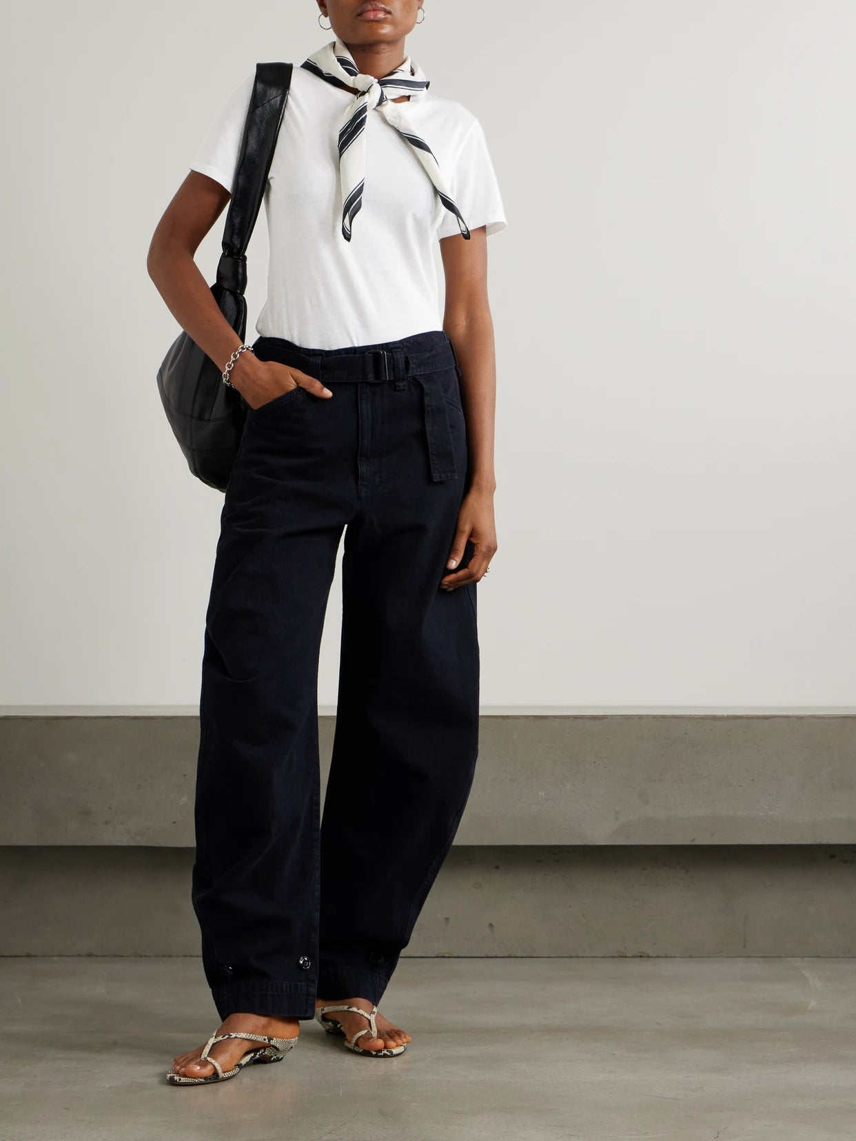 Image of a model wearing Tops. Product name - Mariela Cotton-jersey T-shirt in White colour by brand - Nili Lotan