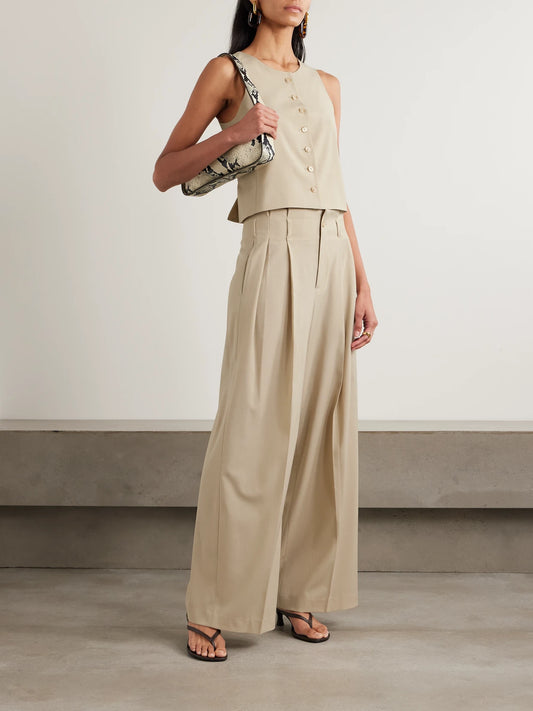 Image of a model wearing Pants. Product name - Percie Pleated Wool-blend Wide-leg Pants in Beige colour by brand - KALLMEYER