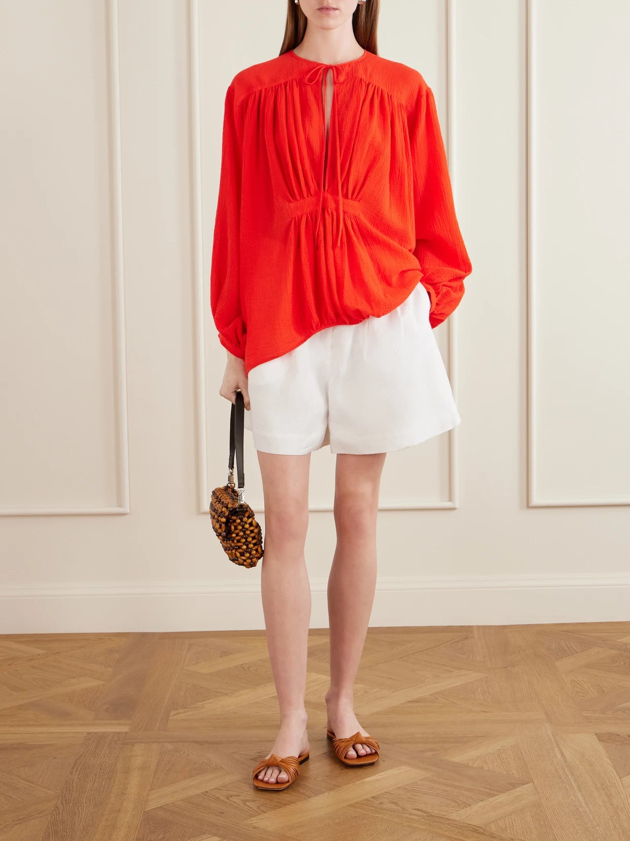 Image of a model wearing Tops. Product name - Hazy Nipple Gathered Cotton Shirt in x small colour by brand - Les Vacances D'Irina
