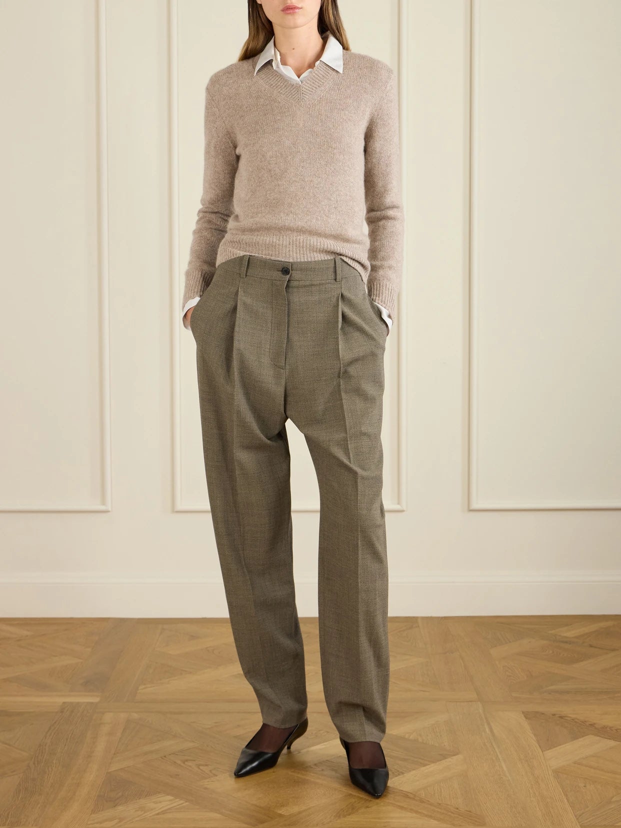 Image of a model wearing Outerwear. Product name - Nalini Cashmere Sweater in Beige colour by brand - The Row