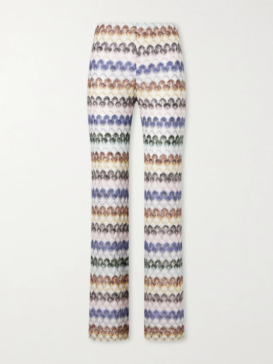 Image of a model wearing Pants. Product name - Embellished Crochet-knit Flared Pants in Multi colour by brand - Missoni